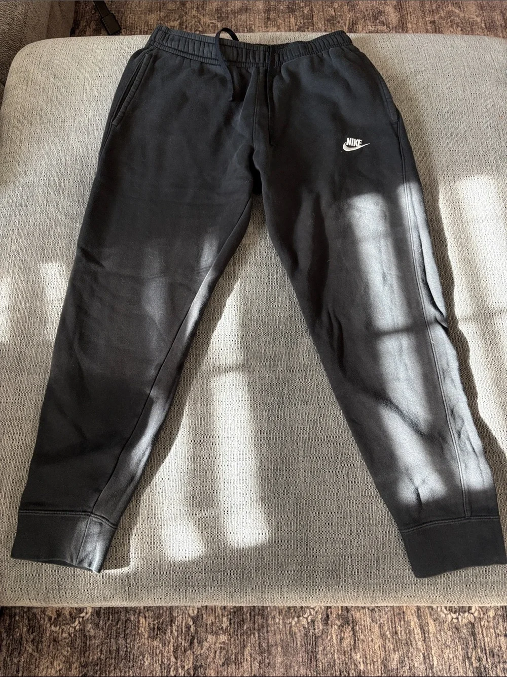 Nike Black Jogger Sweatpants with White Swoosh
